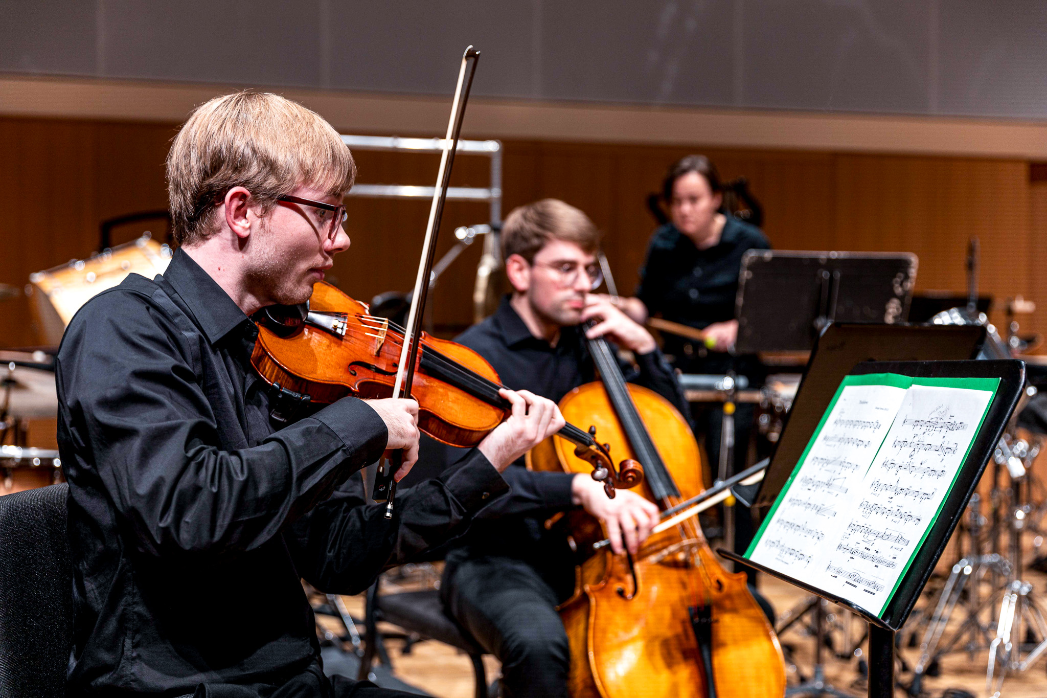 A photo of a group of students playing instruments from the New Music Initiative